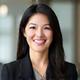 Portrait of Emily Chen, local business owner, smiling